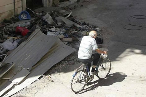 Fr. Frans was known for riding his bike around Homs, even after the war began. 